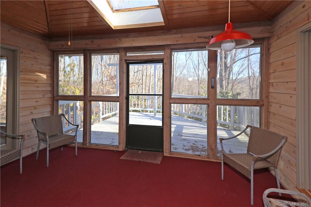 435 Clemson Road Waynesville, NC 28786 - Photo 5 of 21 a room with furniture and a window