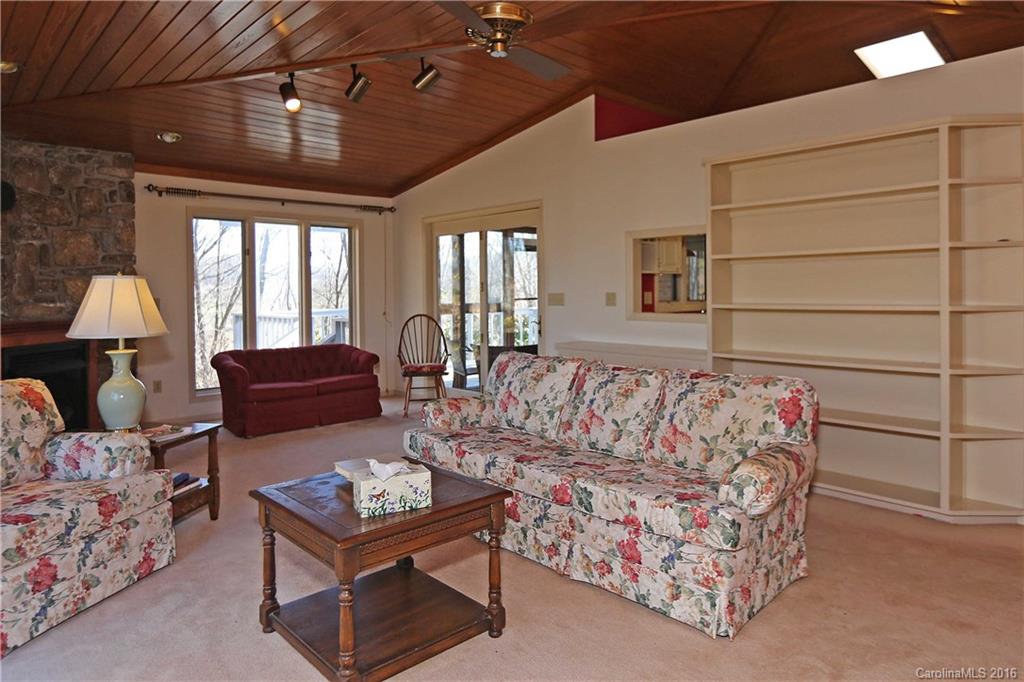 435 Clemson Road Waynesville, NC 28786 - Photo 8 of 21 a living room with furniture
