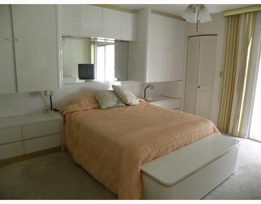 3202 Portofino Point, Unit L2 Coconut Creek, FL 33066 - Photo 7 of 9 Master Bedroom