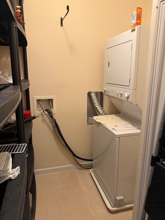 107 Clocktower Drive, Unit 207 Waltham, MA 02452 - Photo 13 of 18 a utility room with dryer and washer