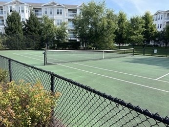 107 Clocktower Drive, Unit 207 Waltham, MA 02452 - Photo 15 of 18 a view of a tennis court