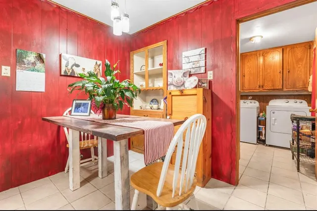 a view of a dining room with furniture