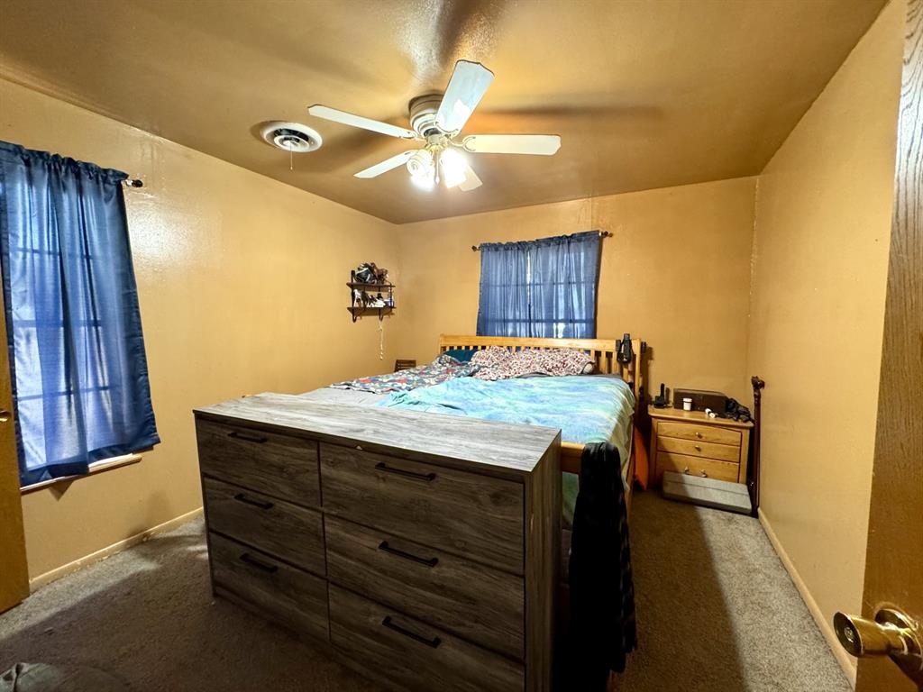 609 South Files Street Itasca, TX 76055 - Photo 19 of 29 a room with storage and utility room