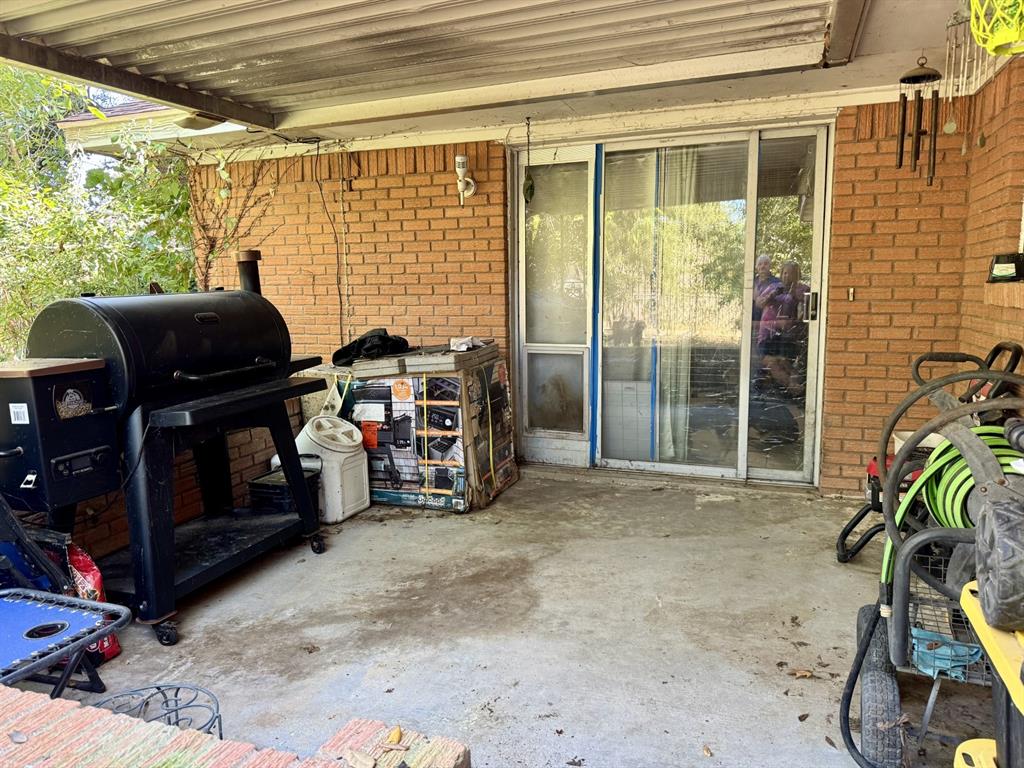 609 South Files Street Itasca, TX 76055 - Photo 27 of 29 a view of a room with furniture and windows