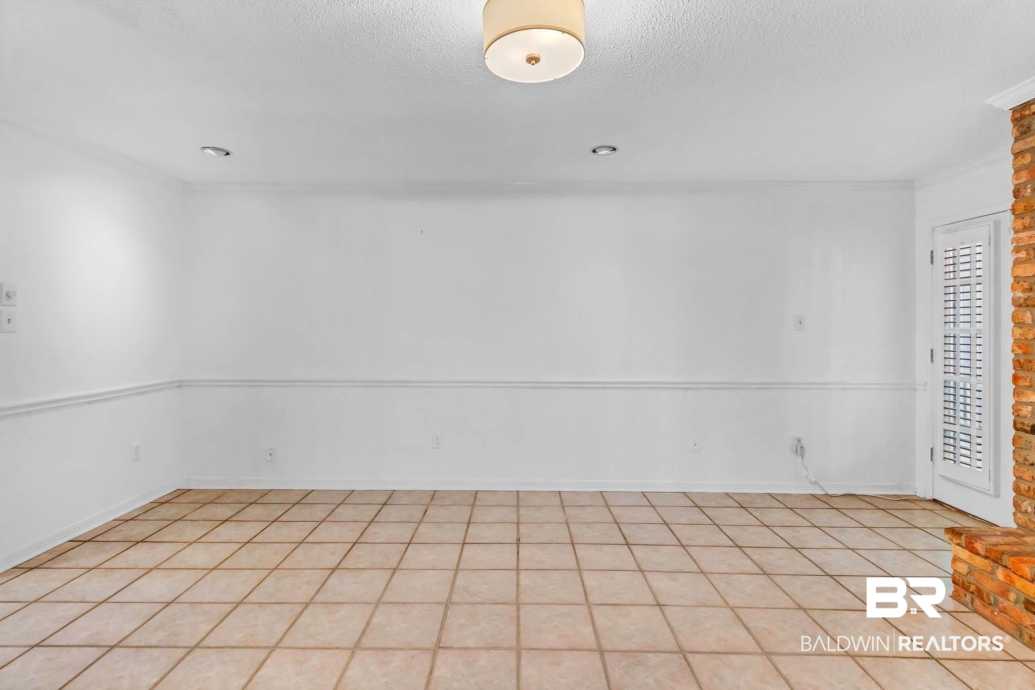 309 West Brandy Run Road Mobile, AL 36608 - Photo 12 of 100 Unfurnished room featuring a textured ceiling and light tile patterned floors
