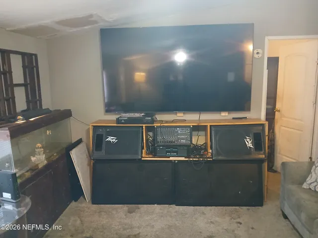 view of a room with wooden floor