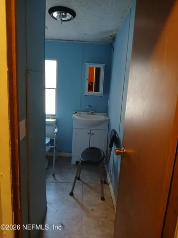 a workspace with furniture and a window