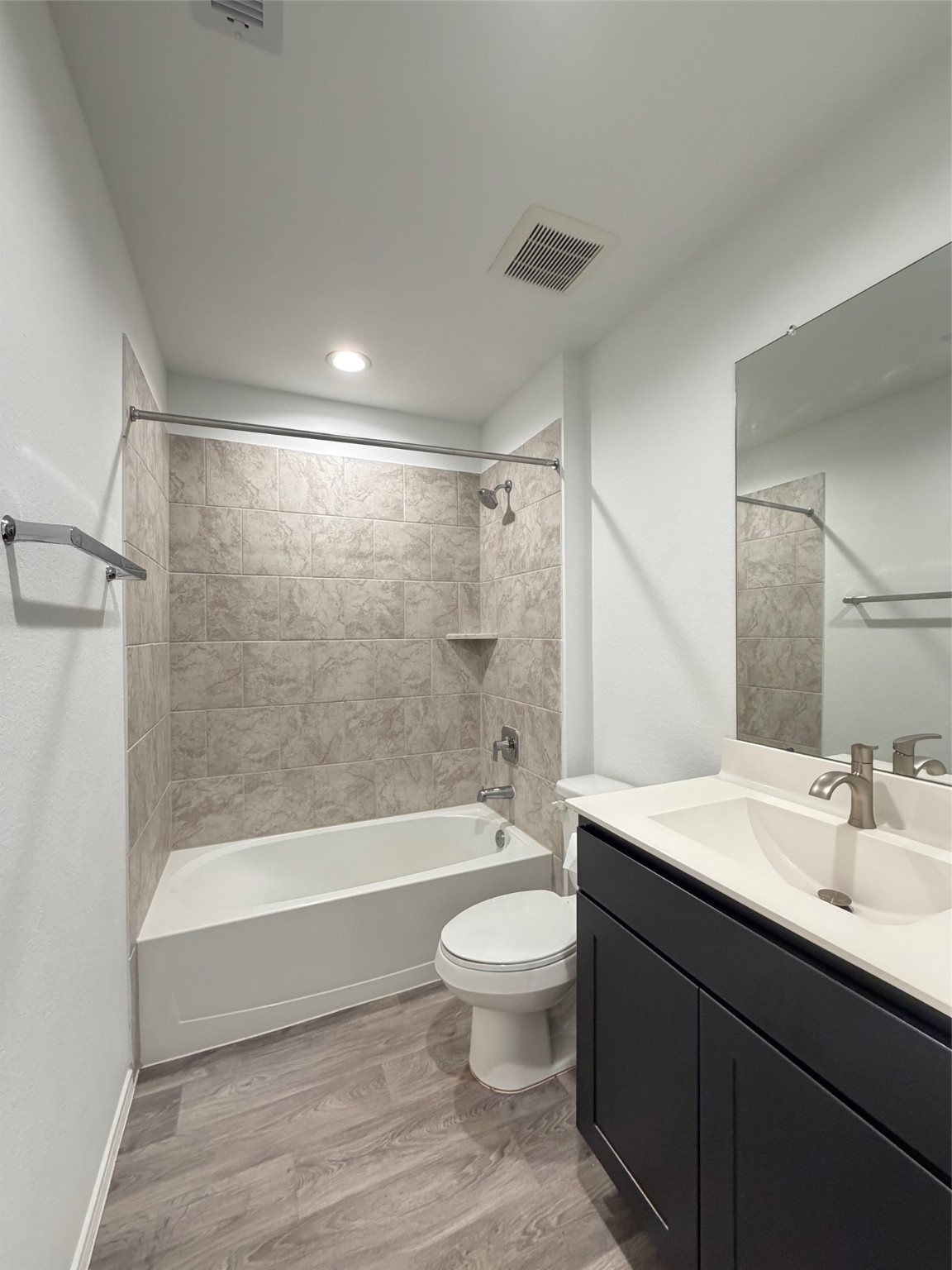 2913 Willow Gulch Way Rosenberg, TX 77469 - Photo 8 of 16 a bathroom with a bathtub shower sink mirror and toilet