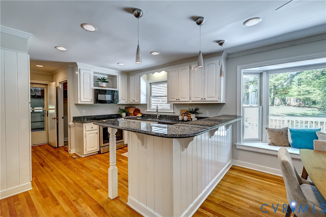 5201 Stone Horse Road Glen Allen, VA 23059 - Photo 15 of 54 a kitchen with stainless steel appliances granite countertop a stove and a sink
