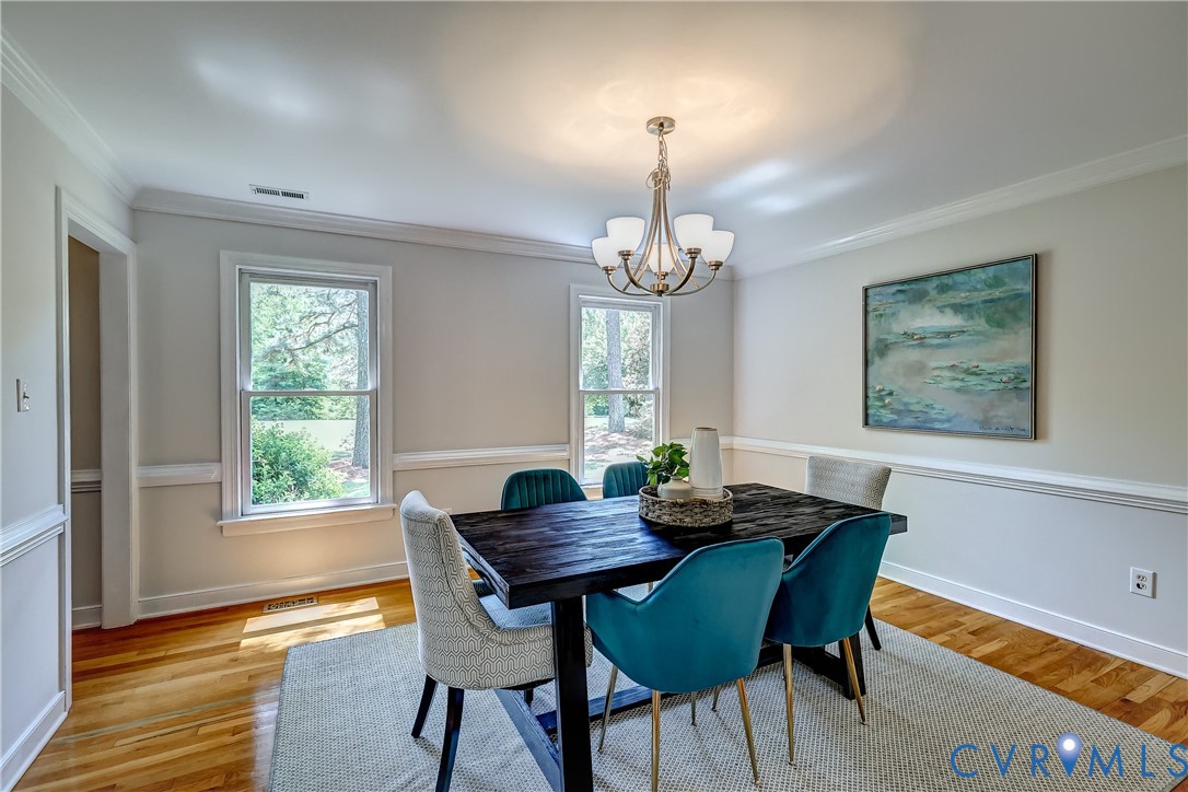 5201 Stone Horse Road Glen Allen, VA 23059 - Photo 19 of 54 a view of a dining room with furniture window and wooden floor