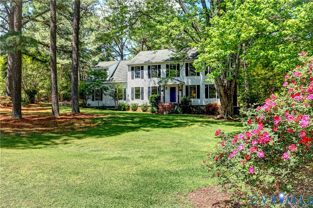 5201 Stone Horse Road Glen Allen, VA 23059 - Photo 2 of 54 a front view of a house with a yard