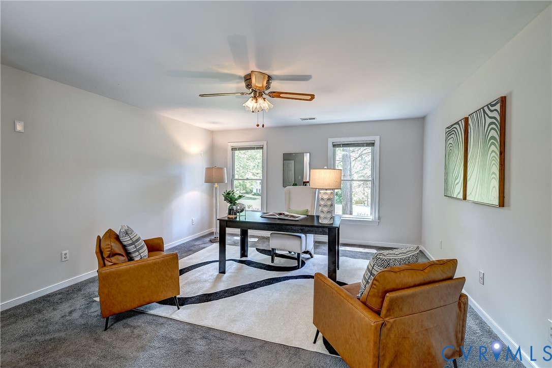 5201 Stone Horse Road Glen Allen, VA 23059 - Photo 22 of 54 a living room with furniture ceiling fan and a window