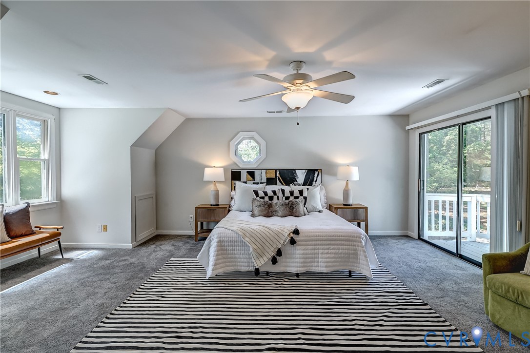 5201 Stone Horse Road Glen Allen, VA 23059 - Photo 28 of 54 a bedroom with a large bed and a window