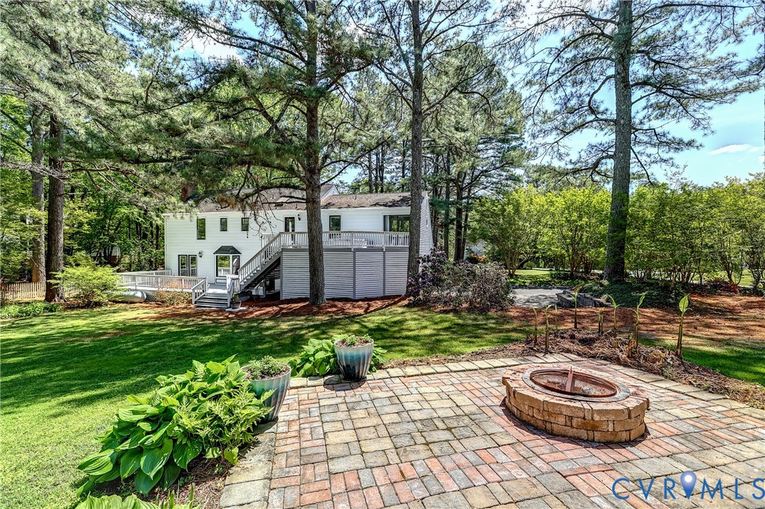 5201 Stone Horse Road Glen Allen, VA 23059 - Photo 48 of 54 a view of a backyard with plants and a patio