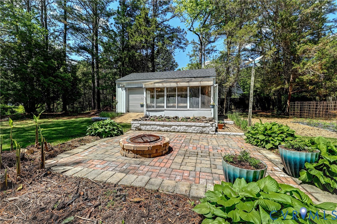 5201 Stone Horse Road Glen Allen, VA 23059 - Photo 49 of 54 a front view of a house with garden