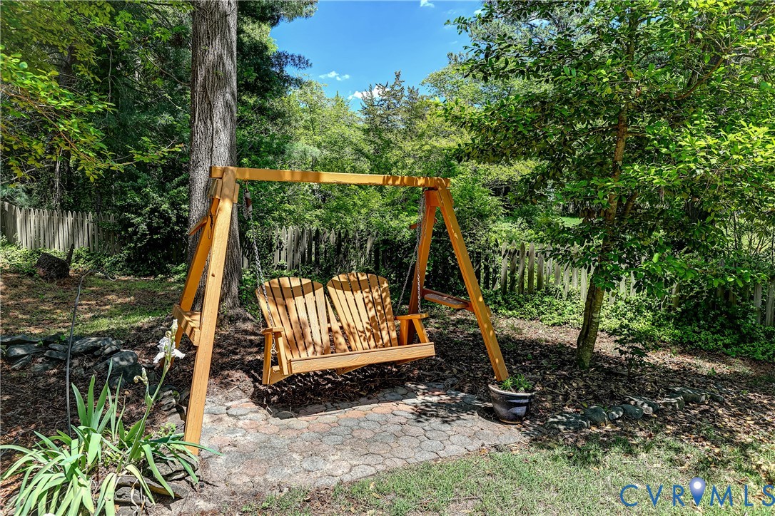 5201 Stone Horse Road Glen Allen, VA 23059 - Photo 52 of 54 a wooden bench sitting in the middle of a yard