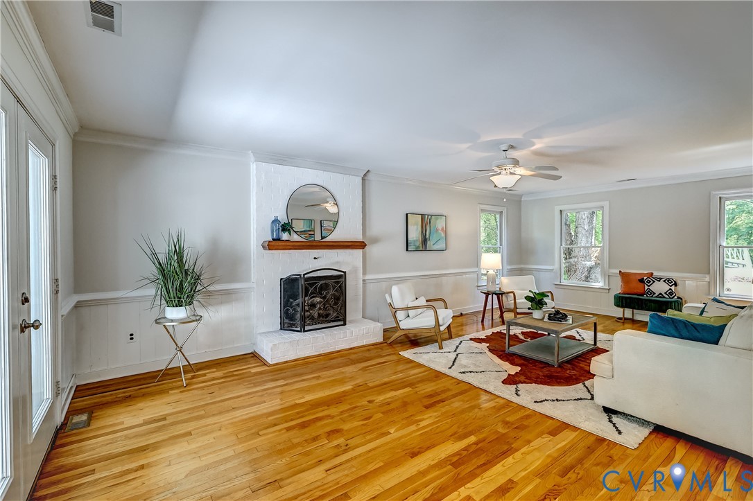 5201 Stone Horse Road Glen Allen, VA 23059 - Photo 10 of 54 a living room with furniture and a fireplace