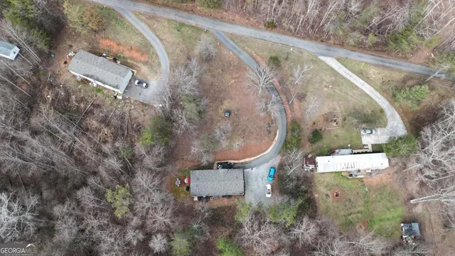 an aerial view of residential house with outdoor space