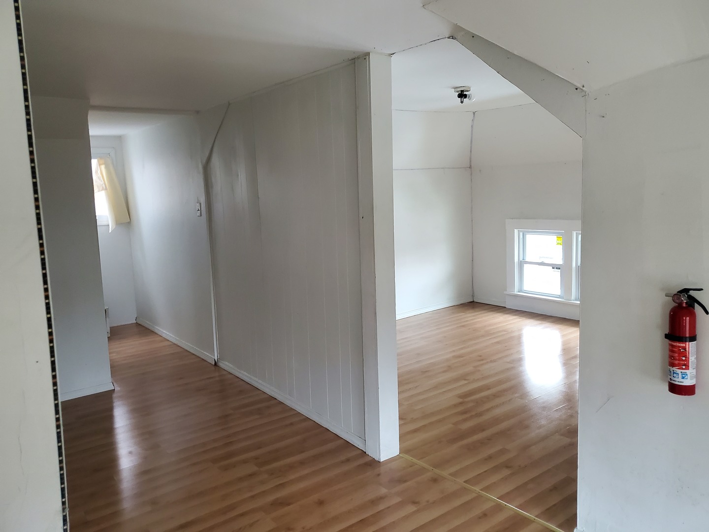 136 John Street DeKalb, IL 60115 - Photo 19 of 25 a view of a hallway with wooden floor