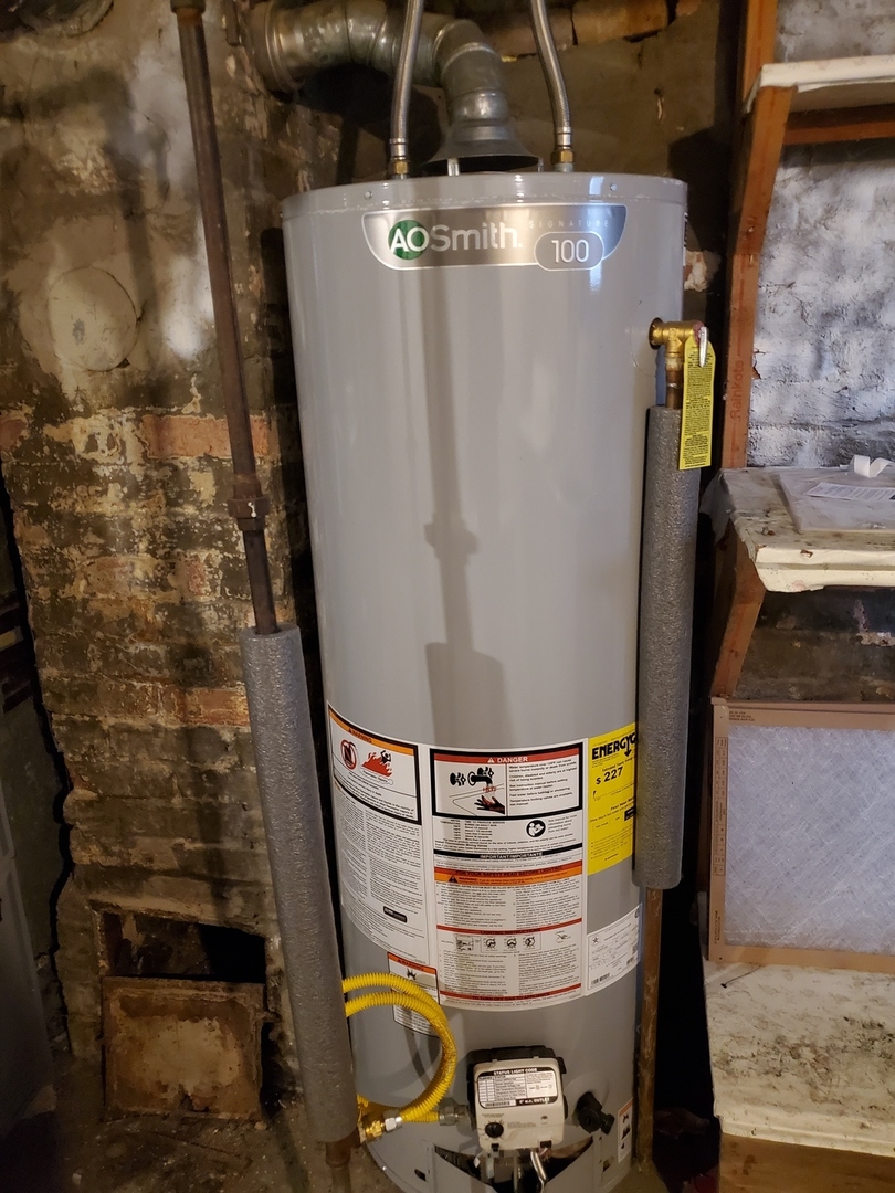136 John Street DeKalb, IL 60115 - Photo 23 of 25 a view of water heater room