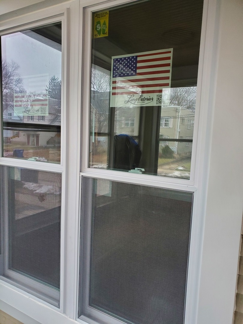 136 John Street DeKalb, IL 60115 - Photo 25 of 25 a view of a door and a window