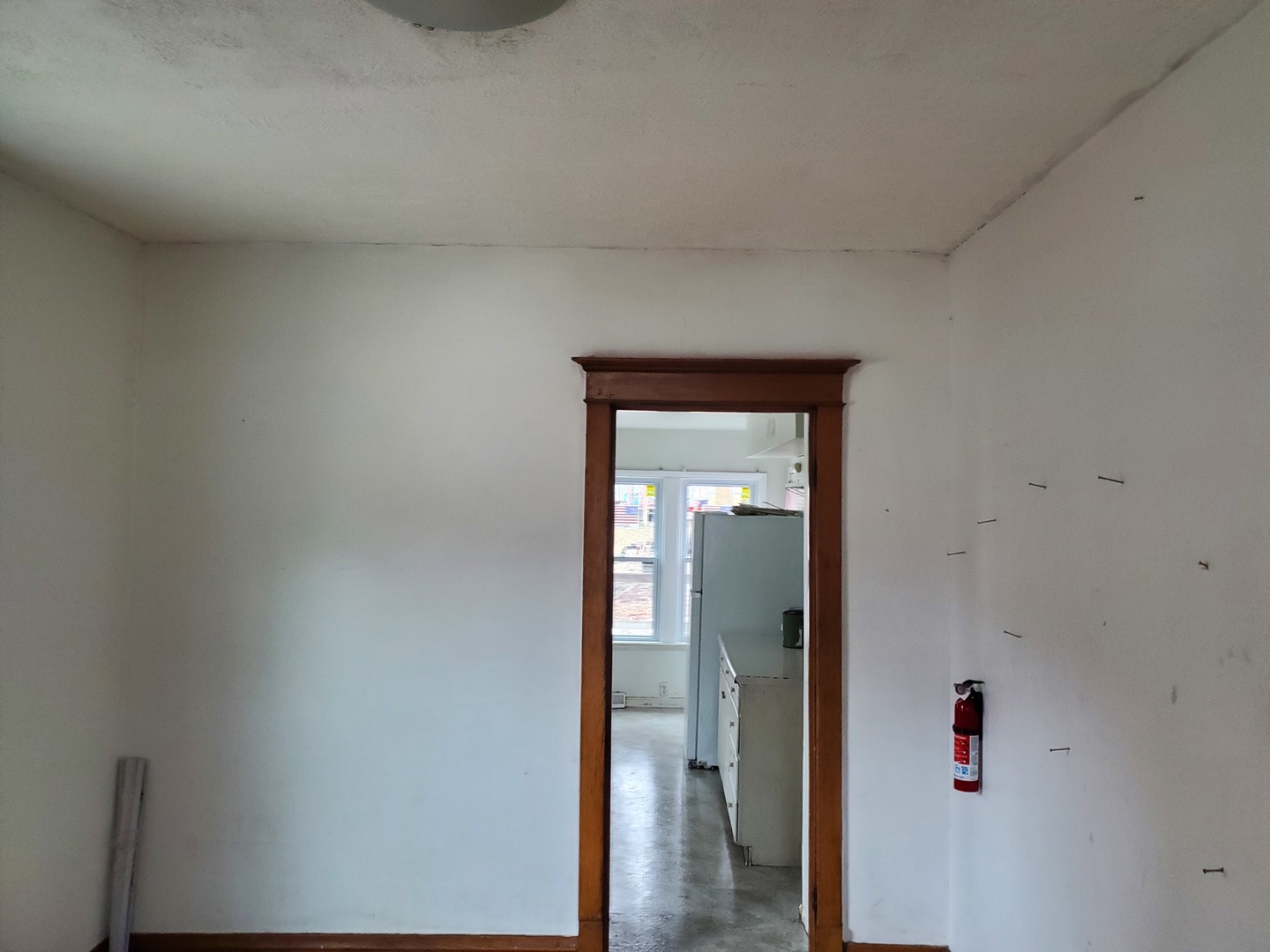 136 John Street DeKalb, IL 60115 - Photo 6 of 25 a view of a hallway