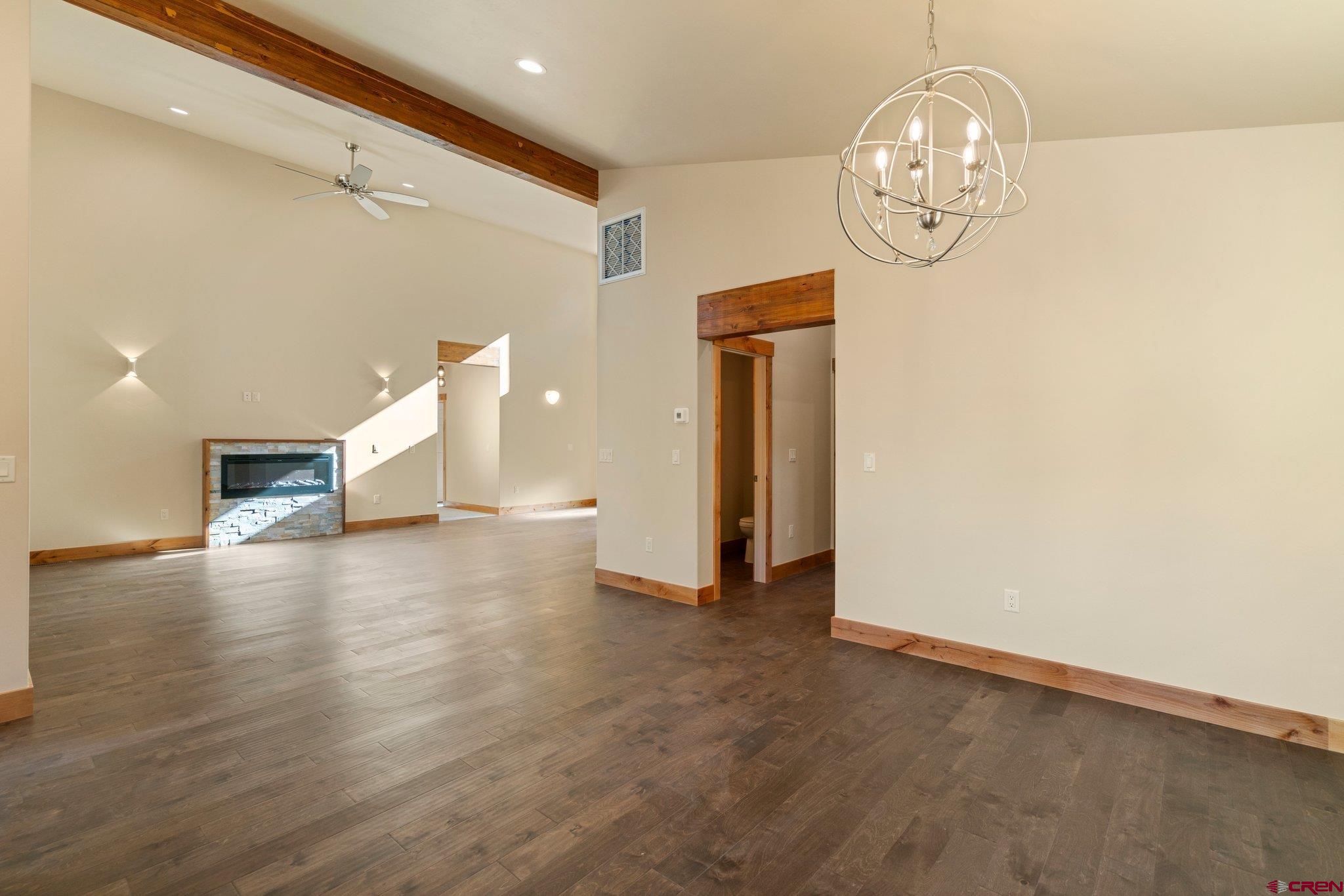 283 Edgemont Meadows Road Durango, CO 81301 - Photo 20 of 34 a view of a livingroom with wooden floor
