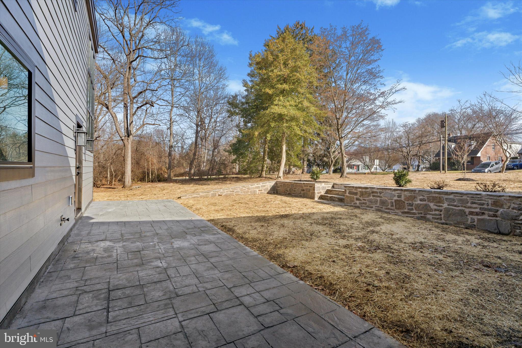 410 Sandy Bank Road Media, PA 19063 - Photo 4 of 53 Stamped concrete front patio