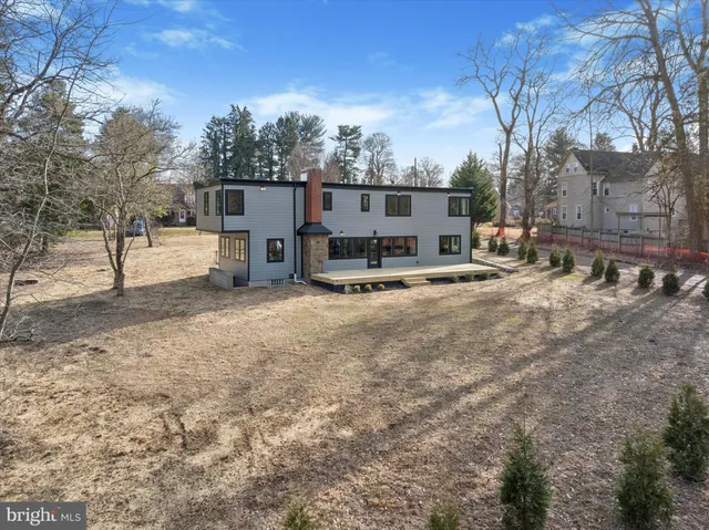 a view of a house with a snow in front of it