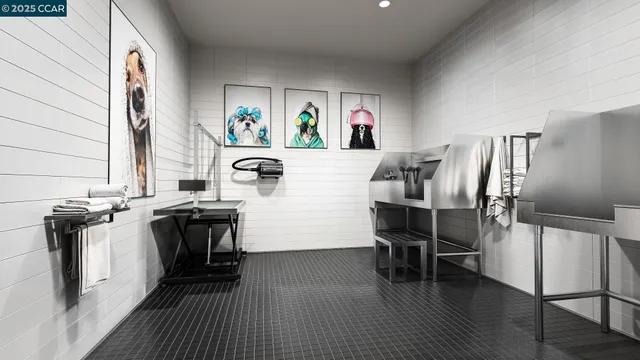 a kitchen with a refrigerator and a stove top oven