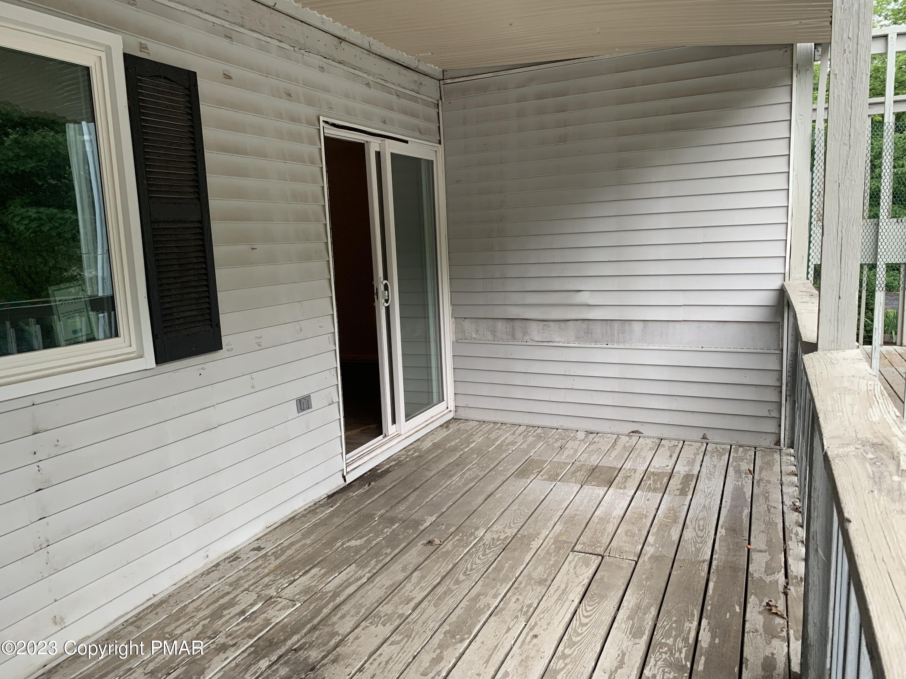 130 View Court, Unit 103 Mount Pocono, PA 18344 - Photo 11 of 11 a view of a wooden deck