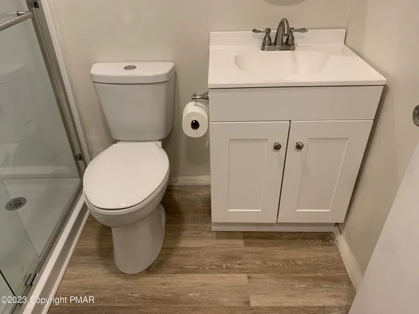 a bathroom with a sink and a toilet