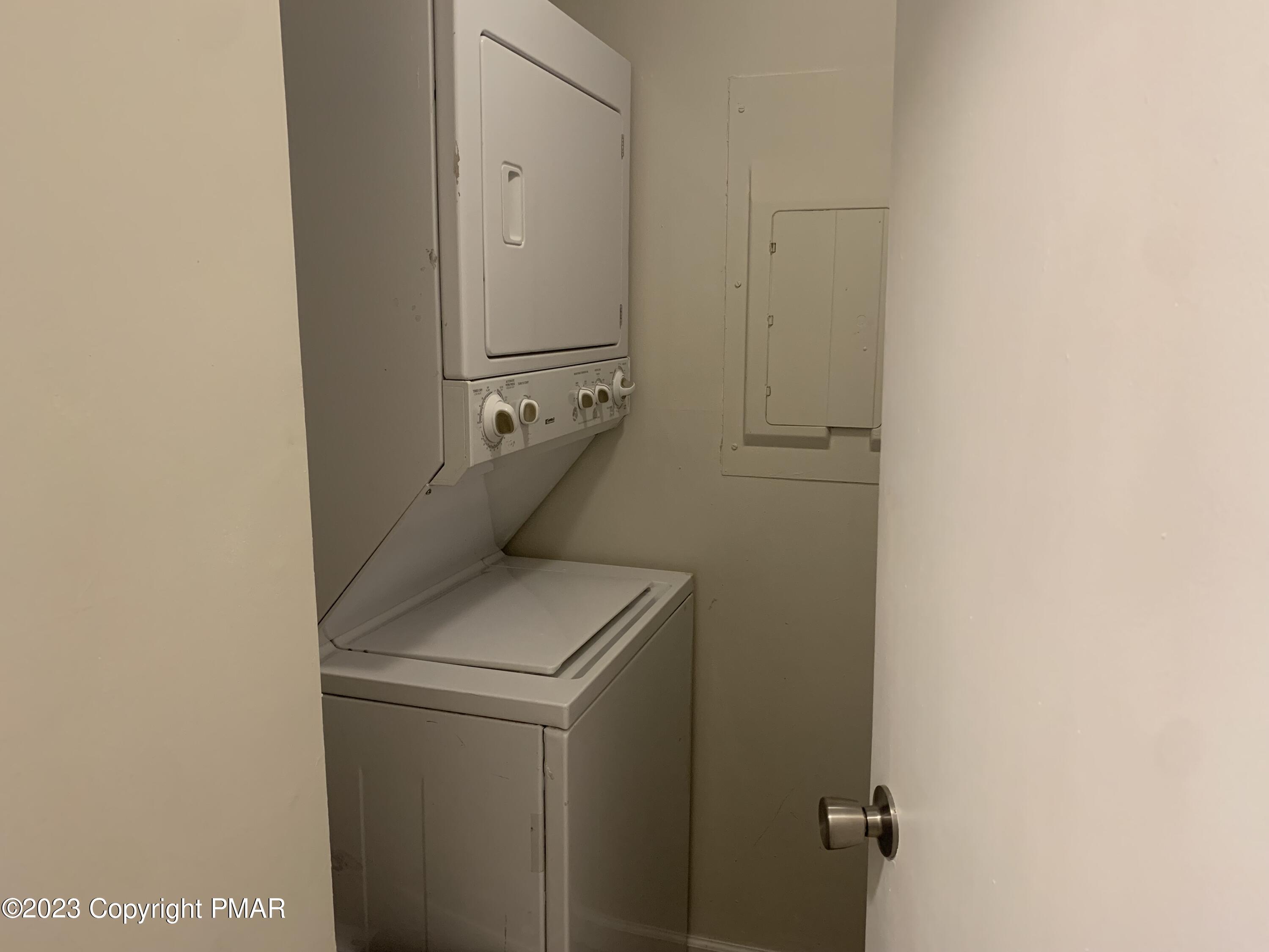 130 View Court, Unit 103 Mount Pocono, PA 18344 - Photo 8 of 11 a utility room with dryer and washer