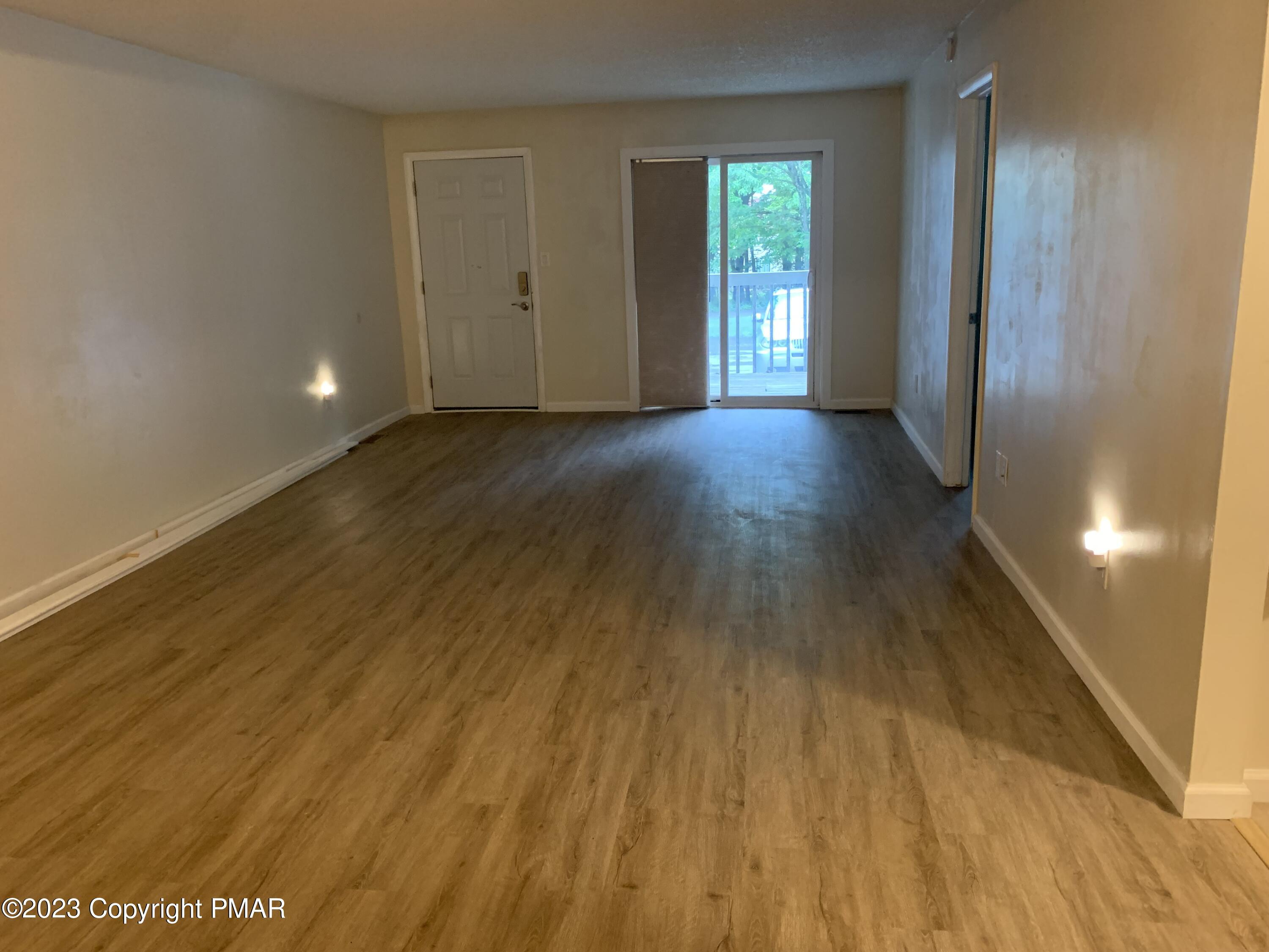 130 View Court, Unit 103 Mount Pocono, PA 18344 - Photo 10 of 11 a view of livingroom with wooden floor