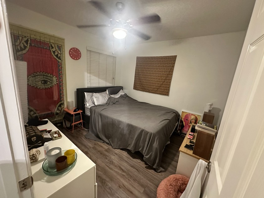 2005 Glen Allen Street, Unit 110 Austin, TX 78704 - Photo 10 of 13 a bedroom with a bed and a window