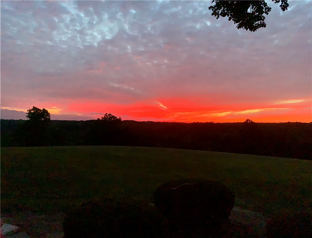 5669 O Neall Road Waynesville, OH 45068 - Photo 66 of 72 Witness a captivating evening sky, offering serene and expansive views.