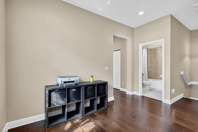 a view of a livingroom with furniture and wooden floor