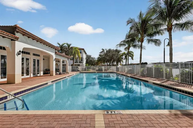 a view of a house with a swimming pool
