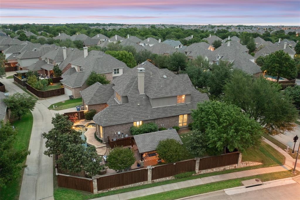 1401 Luckenbach Drive Allen, TX 75013 - Photo 1 of 1 an aerial view of a house with a garden