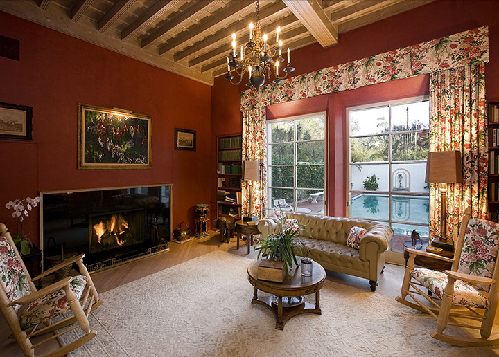 415 Hot Springs Road Montecito, CA 93108 - Photo 4 of 6 a living room with furniture a fireplace and a large window