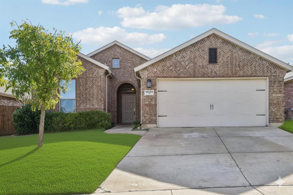 10433 Unity Drive Fort Worth, TX 76108 - Photo 1 of 1 a front view of a house with garden