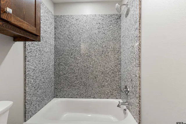 a bathroom with a bathtub