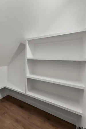 a view of a room with rack on the wall