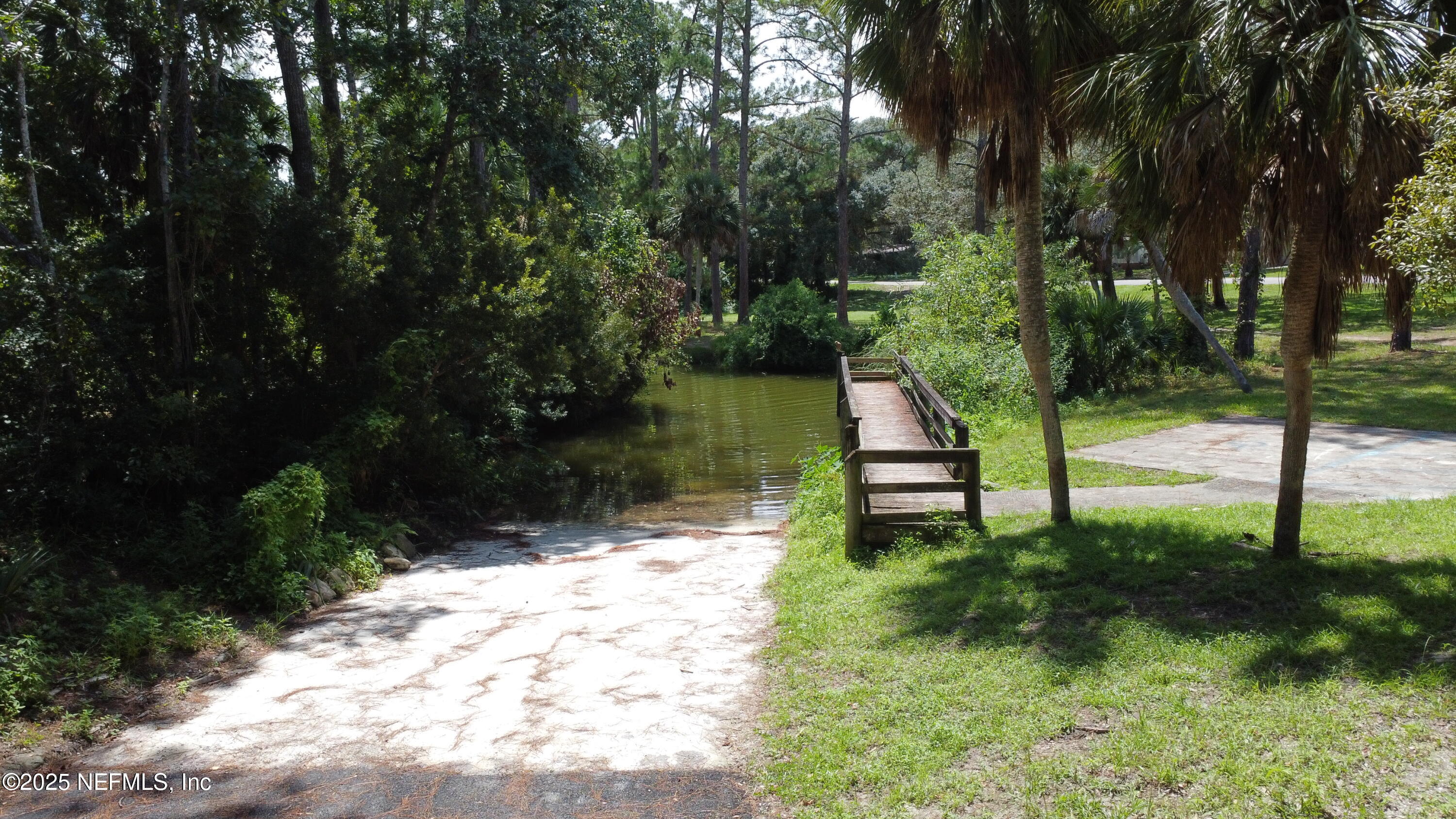 0 Britt Interlachen, FL 32148 - Photo 6 of 12 a view of a bench in a garden
