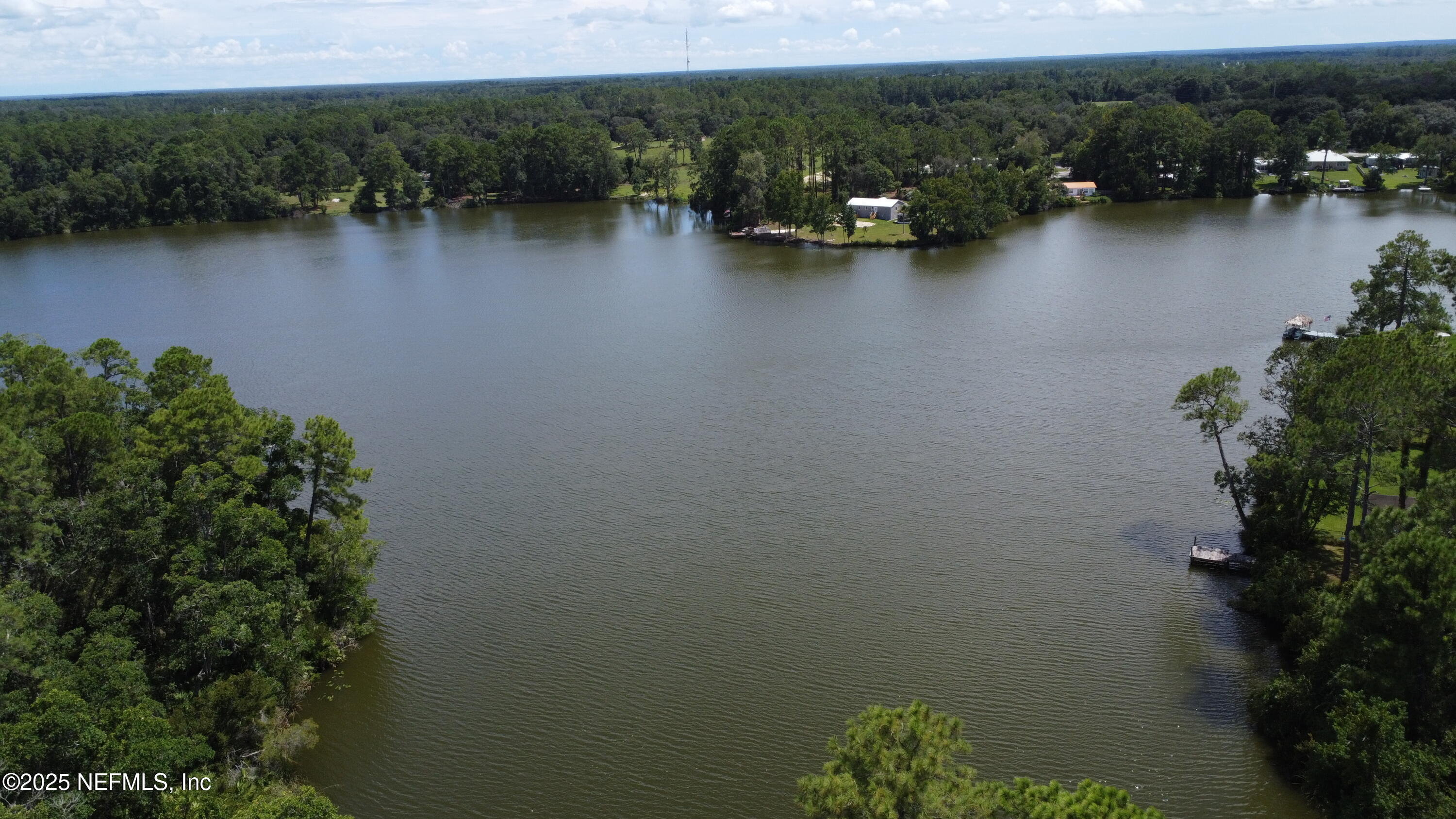 0 Britt Interlachen, FL 32148 - Photo 8 of 12 a view of a lake with boats and trees in the background