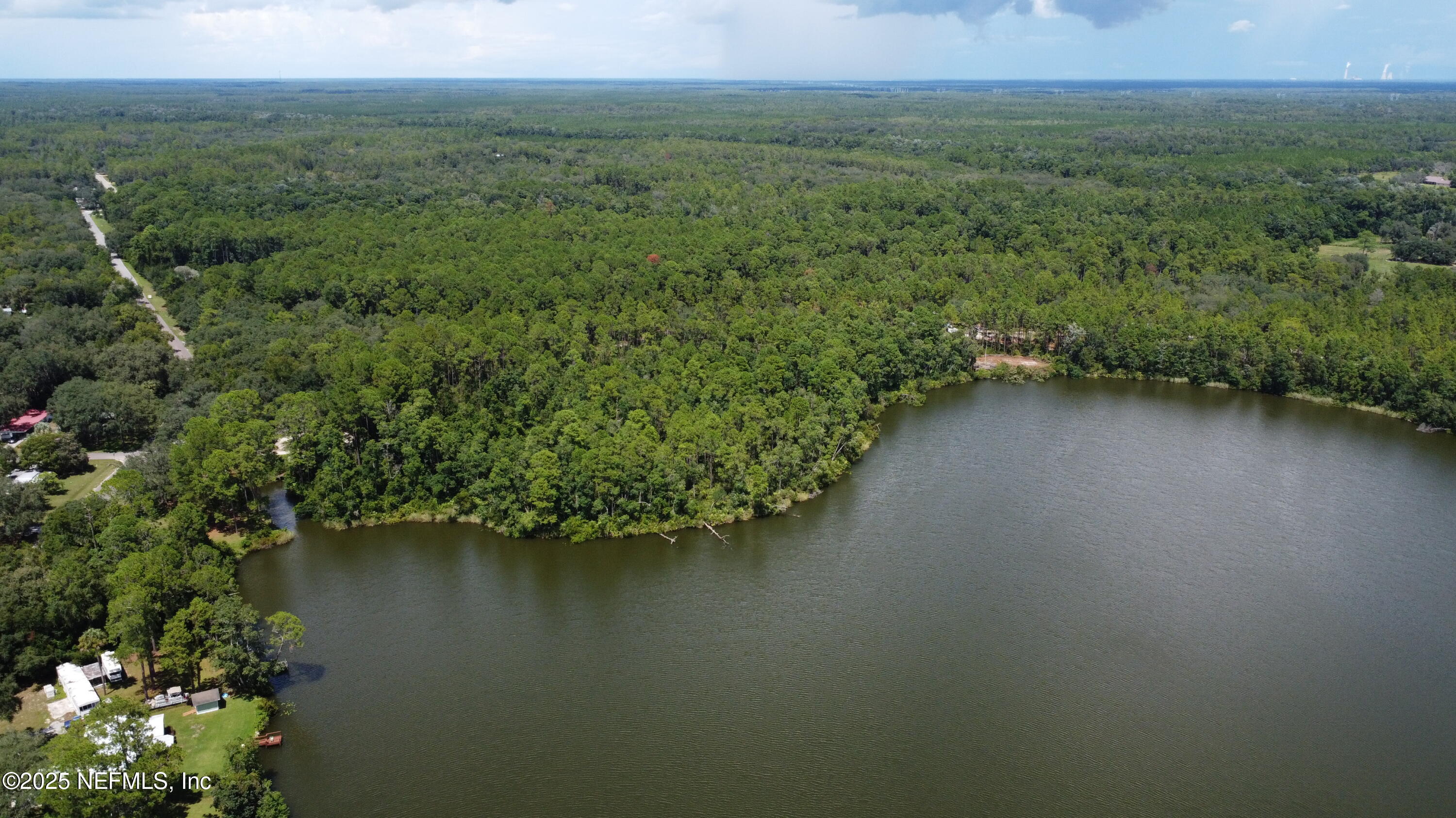 0 Britt Interlachen, FL 32148 - Photo 10 of 12 a view of a lake with a outdoor space