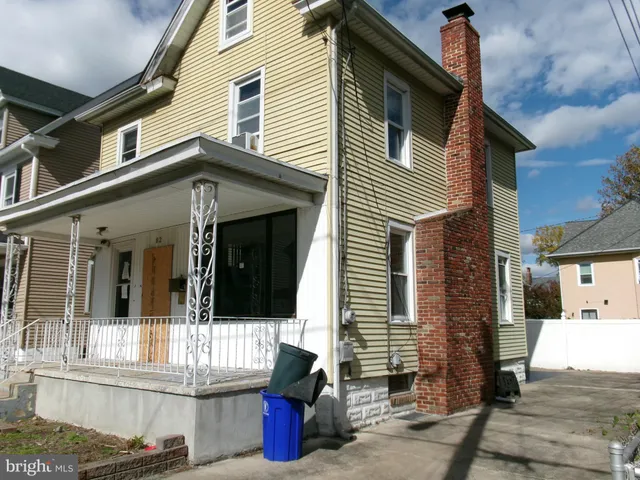 a front view of a house with a garage