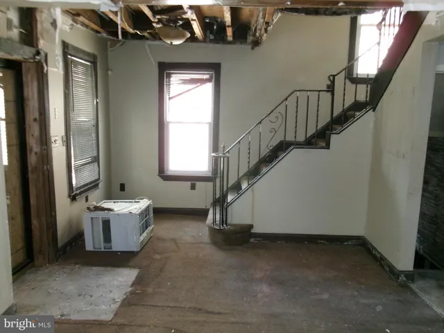 a view of an entryway with staircase