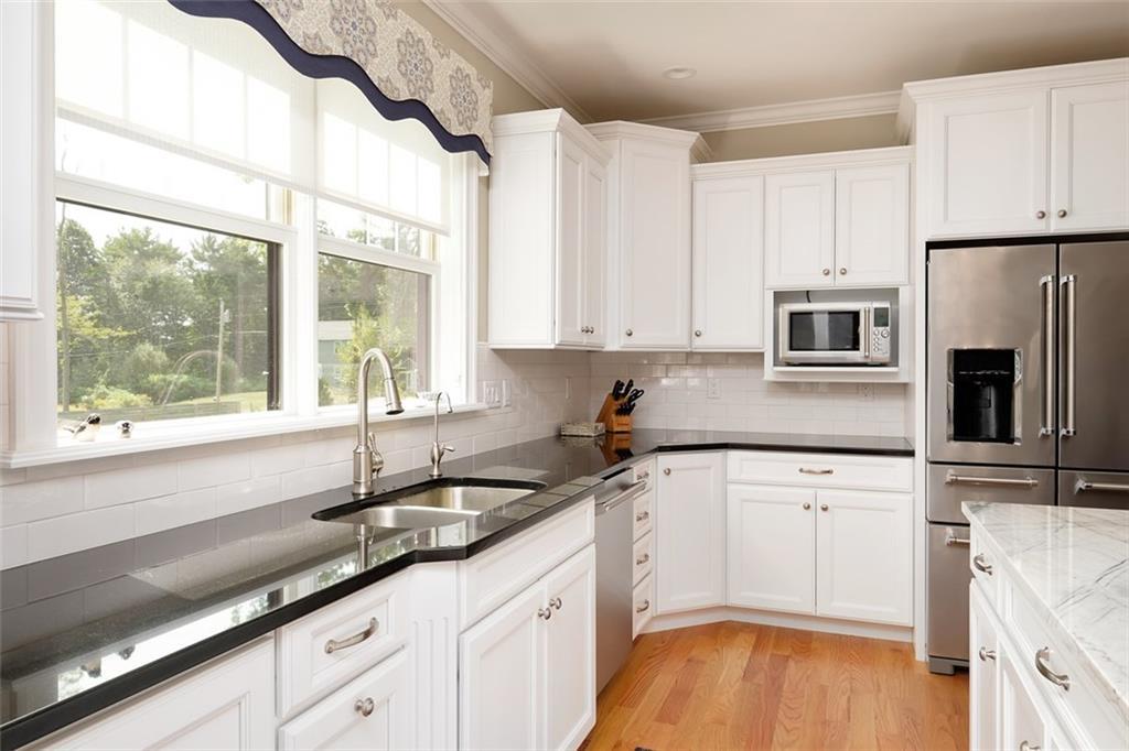 131 Shore Road Cape Neddick, ME 03902 - Photo 6 of 35 Gleaming countertops and stainless...