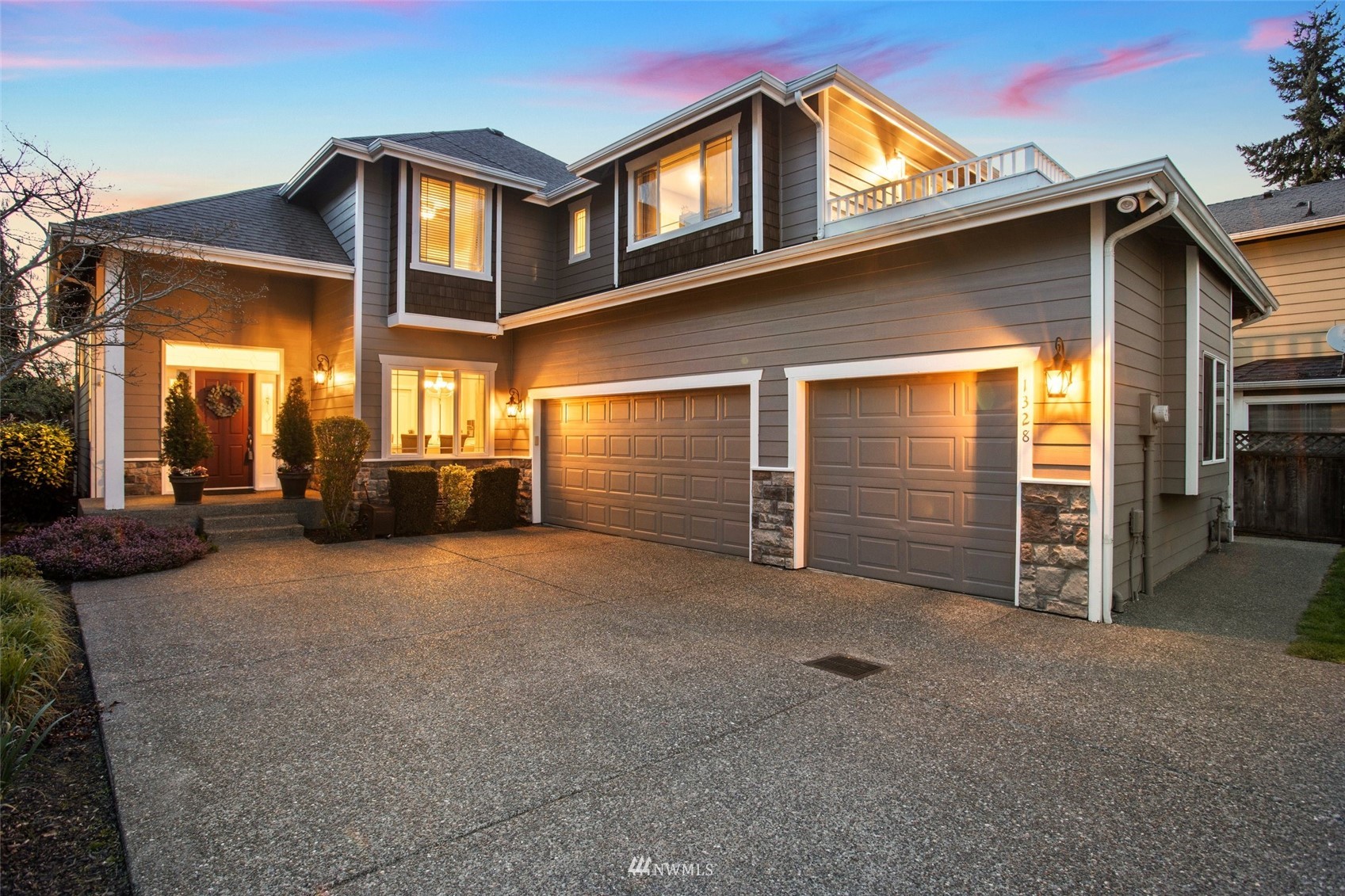 1328 North 39th Street Renton, WA 98056 - Photo 1 of 40 a view of a house with a garage